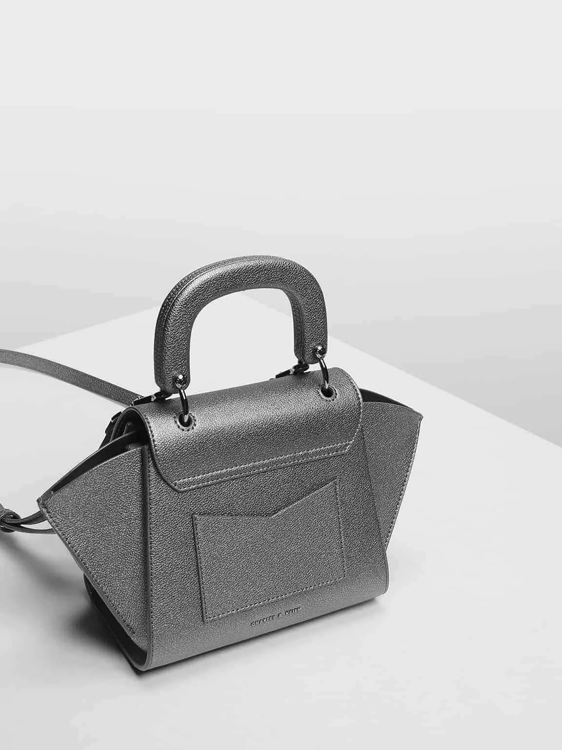 charles & keith geometric structured city bag